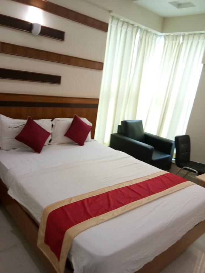 Hlv Grand Inn Бангалор Экстерьер фото